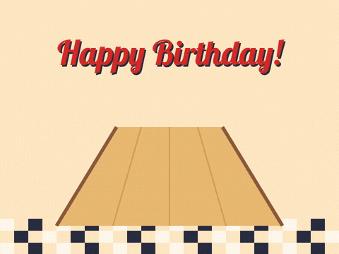Birthday Strike Bowling Candle Pins Happy birthday strike as a purple bowling ball rolls down the lane and knocks over birthday candle pins
