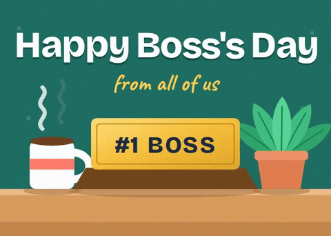 Happy Boss's Day from all of us with a gold #1 Boss nameplate on a desk beside coffee and a plant