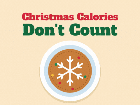 Christmas Calories Dont Count Cookie Christmas calories don't count joke with a big iced gingerbread cookie on a plate losing three bites and scattering crumbs