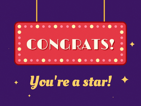 Congrats theatre marquee sign with chasing light bulbs and You're a star lettering on deep purple