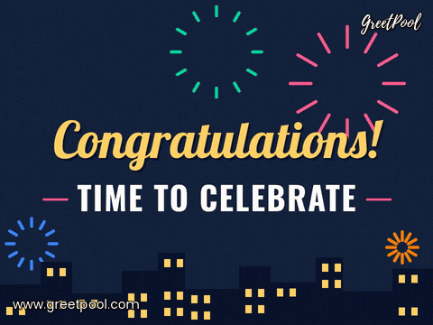 Congratulations time to celebrate lettering with colourful fireworks bursting over a night city skyline