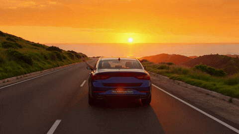 New Adventures Await farewell plate on a blue car driving into an orange sunset as a hand waves goodbye from the window