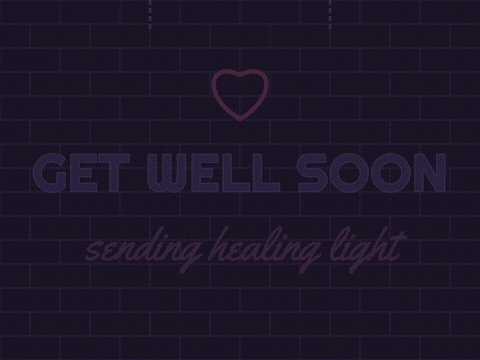 Get well soon neon sign lighting up letter by letter under a pink neon heart, sending healing light