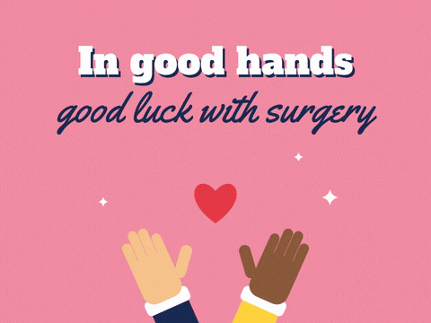 In good hands, good luck with surgery message above two open hands lifting a red heart