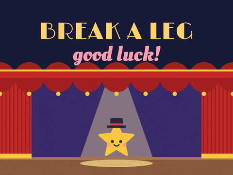 Break a leg good luck gold star in a top hat taking a bow in the spotlight as roses land on the stage