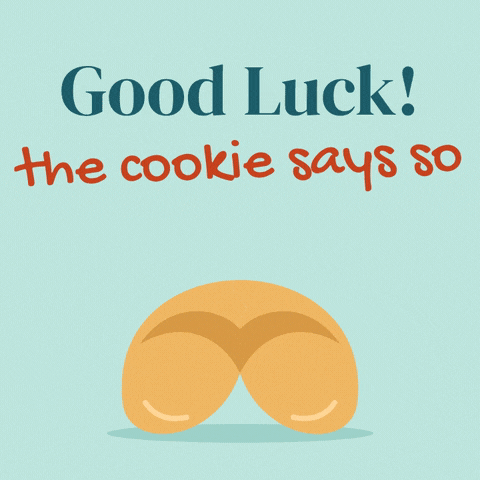 Good Luck Fortune Cookie Good luck fortune cookie cracking open to show a lucky clover slip, the cookie says so