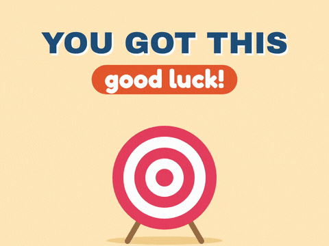 You got this good luck dart hitting the bullseye of a red and white target with gold stars