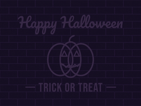 Happy Halloween neon sign with a glowing jack-o-lantern and trick or treat flickering on over a brick wall
