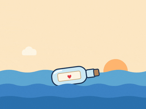 Love You Message In Bottle I love you, always yours, handwritten in red as a message in a bottle with a heart bobs on sunset waves