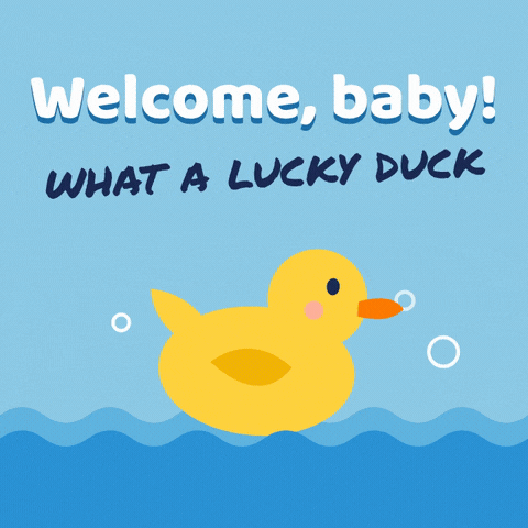 Welcome baby message with a yellow rubber duck bobbing on bath water with bubbles, what a lucky duck