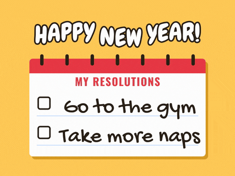 Happy New Year resolutions notepad with Go to the gym crossed out in red and Take more naps ticked off