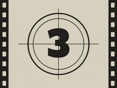Happy New Year retro film leader counting down 3, 2, 1 before red slab letters and Roll the good times script