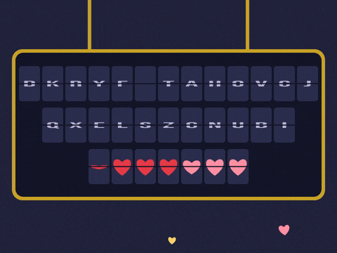 Happy wedding anniversary spelled out on a flipping split-flap board above a row of red and gold hearts