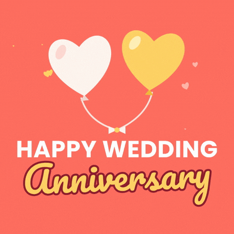 Happy wedding anniversary message under two heart balloons, one white and one gold, on a coral background