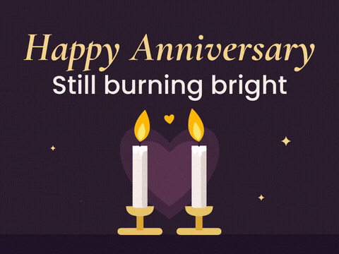 Romantic Wedding Anniversary Candles Happy anniversary, still burning bright message with two lit candles in front of a plum heart