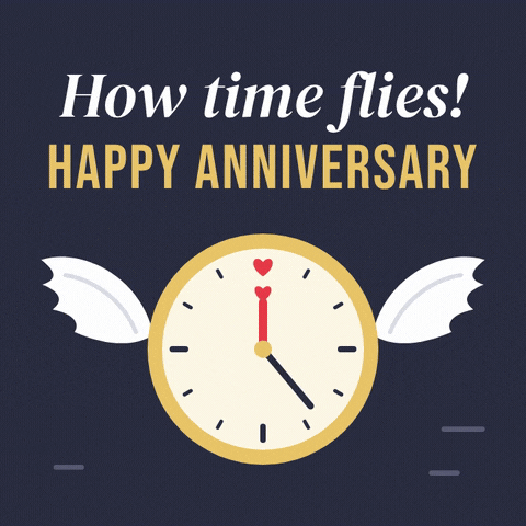 How time flies, happy anniversary message with a winged gold clock and fast spinning heart hands