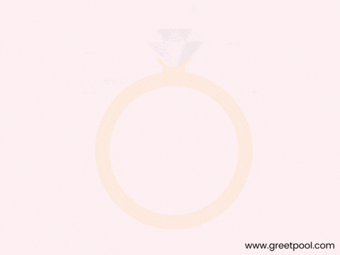 Gold ring framing Congrats above a floral garland, animated elegant wedding GIF
