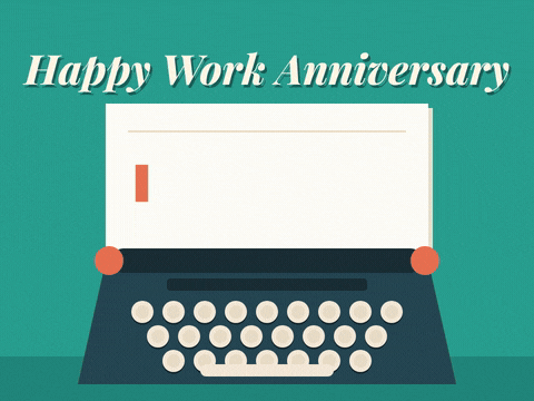 Happy work anniversary with thank you typed letter by letter on a sheet in a vintage typewriter
